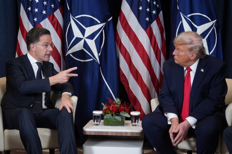 President Donald Trump, right, meets with NATO Secretary General Mark Rutte