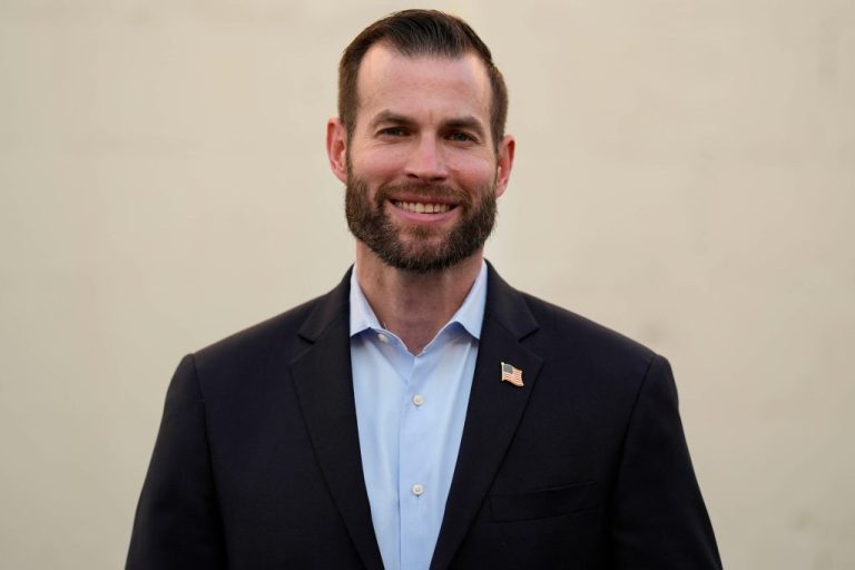 Candidate Clay Fuller, who's running in Georgia's 14th Congressional District poses for a photo during an election night watch party, Tuesday, March 10, 2026, in Rome, Ga. (AP Photo/Mike Stewart)