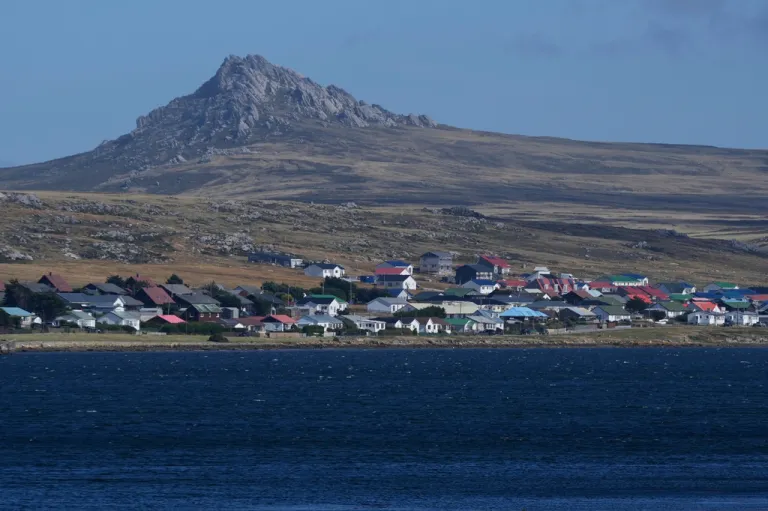 Mount Tumbledown stands tall behind Stanley on the Falkland Islands.