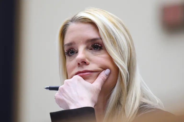 Then-Attorney General Pam Bondi listens as she testifies before a House Judiciary Committee oversight hearing.