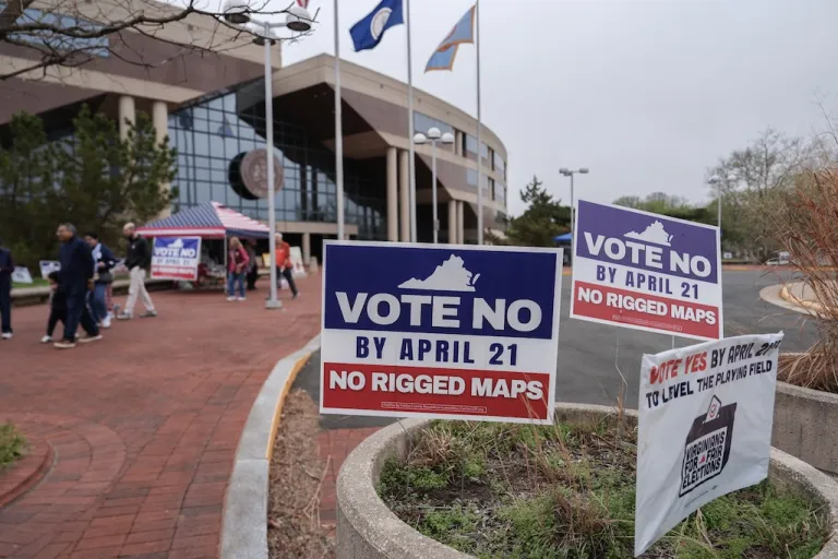 Voters walk outside the Fairfax County Government Center during early voting for the Virginia redistricting referendum, Friday, April 3, 2026, in Fairfax, Va. (AP Photo/Julia Demaree Nikhinson)