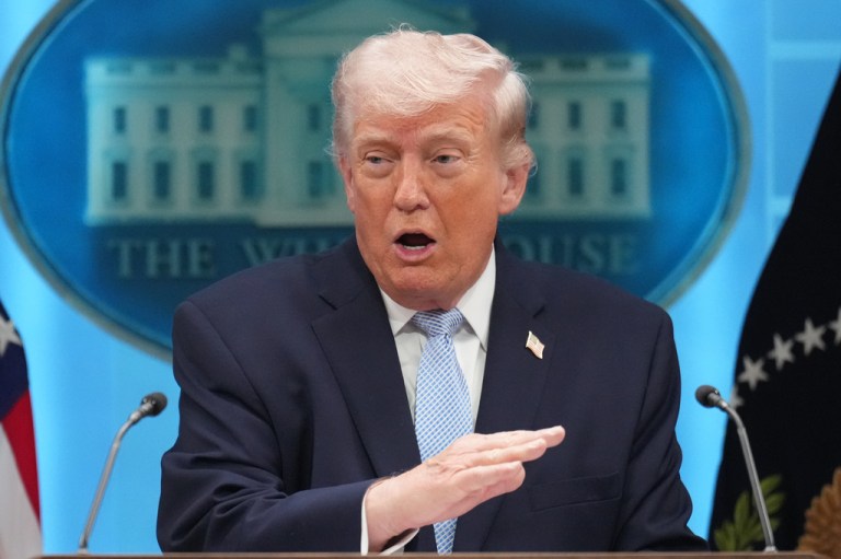 President Donald Trump speaks with reporters in the James Brady Press Briefing Room