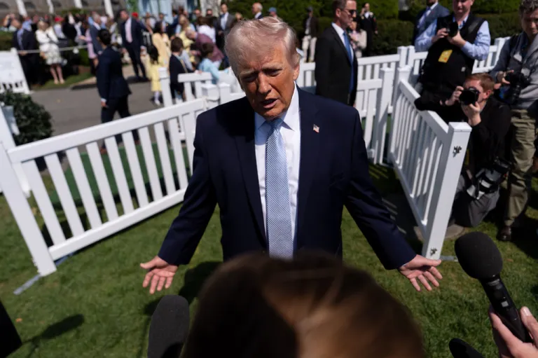 President Donald Trump speaks with reporters during the White House Easter Egg Roll on the South Lawn of the White House, Monday, April 6, 2026, in Washington.
