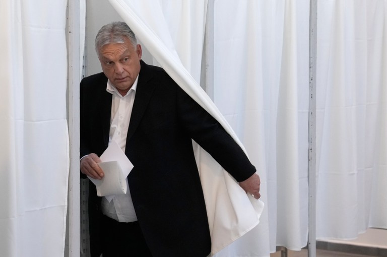 Hungary's Prime Minister Viktor Orban prepares to cast his ballot at a polling station in Budapest