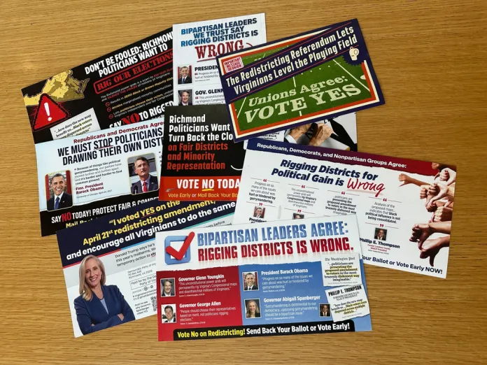 Campaign direct mail advertisements about a Virginia special election on redistricting are on display in Arlington, Va., on April 16, 2026. (AP Photo/Robert Yoon)