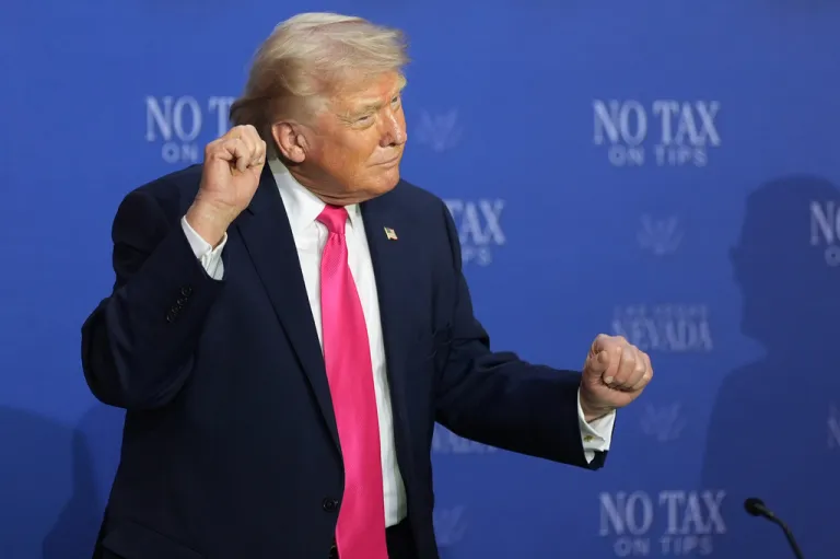 President Donald Trump dances at a roundtable event in Las Vegas about no tax on tips, April 16, 2026.
