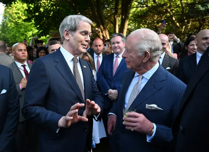 Britain's King Charles III speaks with U.S Treasury Secretary Scott Bessent during a garden party at the British Embassy, Monday, April 27, 2026, in Washington. 