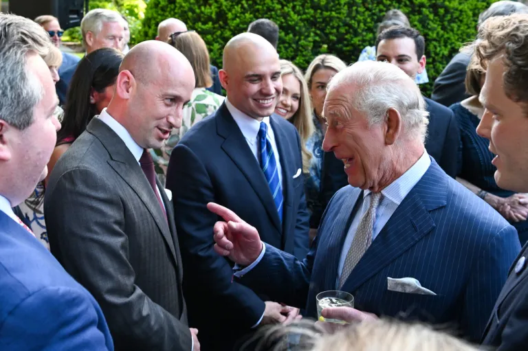 Britain's King Charles III talks with White House Deputy Chief of Staff Stephen Miller during a garden party at the British Embassy in Washington on April 27, 2026.