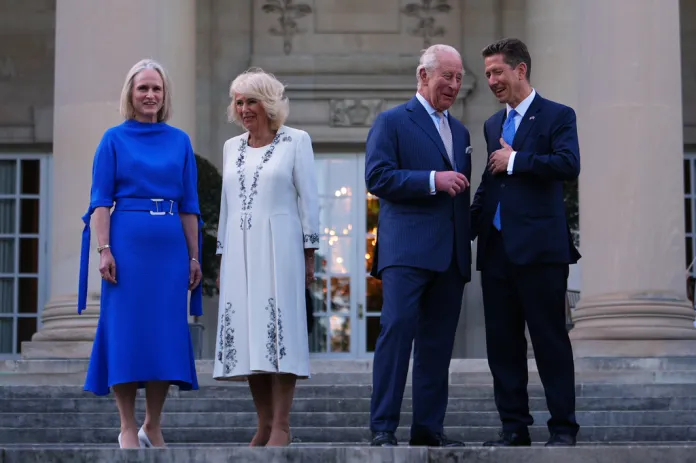 Claire Turner, Britain's Queen Camilla, King Charles III and British Ambassador to the U.S. Christian Turner speak outside of the British Embassy, Monday, April 27, 2026, in Washington. 
