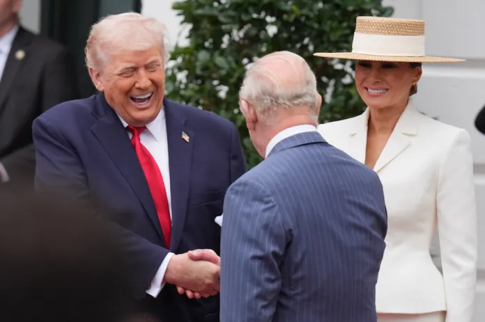 President Donald Trump and first lady Melania Trump greet Britain's King Charles III and Queen Camilla during a State Visit arrival ceremony on the South Lawn of the White House, Tuesday, April 28, 2026, in Washington. (AP Photo/Mark Schiefelbein)
