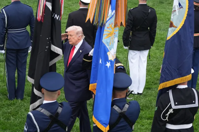 President Donald Trump and Britain's King Charles III review the troops during a State Visit arrival ceremony on the South Lawn of the White House, Tuesday, April 28, 2026, in Washington.