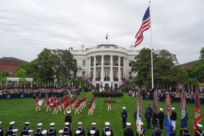 President Donald Trump and first lady Melania Trump stand on stage with Britain's King Charles III and Queen Camilla during a State Visit arrival ceremony on the South Lawn of the White House, Tuesday, April 28, 2026, in Washington.