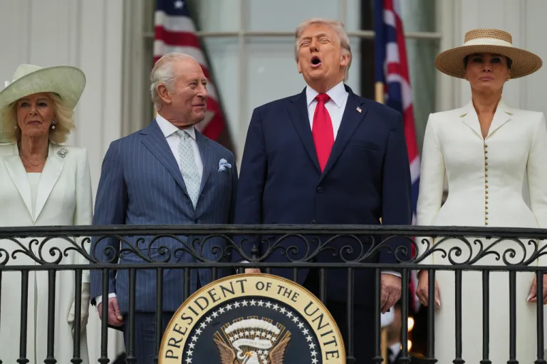 President Donald Trump and Britain's King Charles III laugh together.