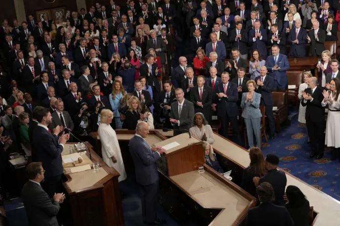 Britain's King Charles III arrives to speak to a joint meeting of Congress in the House Chamber at the U.S. Capitol, Tuesday, April 28, 2026, in Washington, as Queen Camilla looks on.