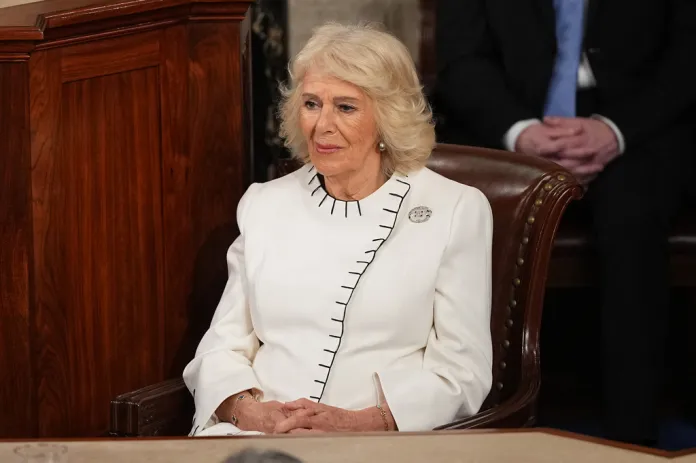 Queen Camilla listens as Britain's King Charles III speaks to a joint meeting of Congress in the House Chamber at the U.S. Capitol, Tuesday, April 28, 2026, in Washington.