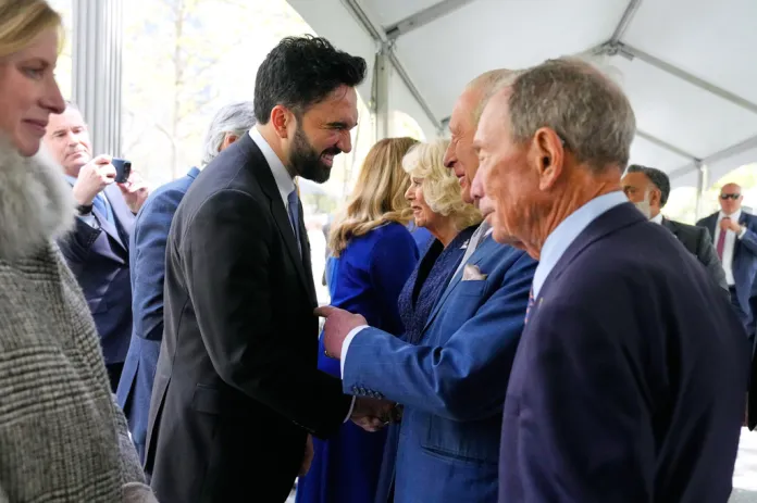 New York City Mayor Zohran Mamdani, left, greets Britain's King Charles III, second from right, during a visit to the 9/11 Memorial, Wednesday, April 29, 2026, in New York. (AP Photo/Yuki Iwamura, Pool)