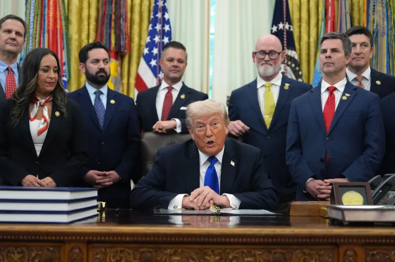President Donald Trump speaks before signing an executive order.