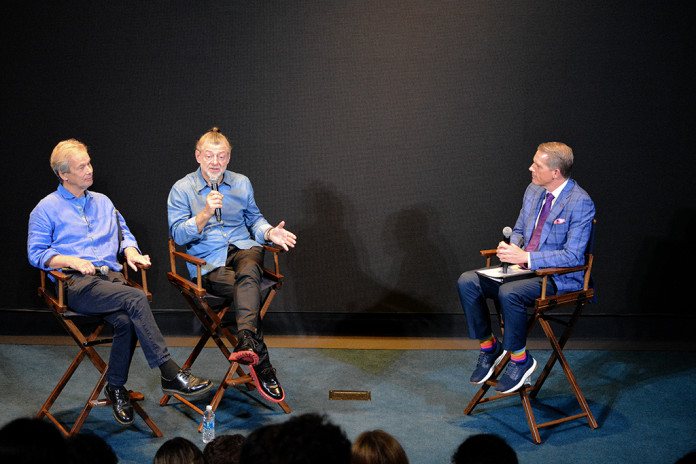 Andy Serkis (C) speaks about his new film, Animal Farm, with business partner Jonathan Cavendish (L) during a fireside chat with Scott Jennings (R). (Judith Y. Kim/Washington Examiner)