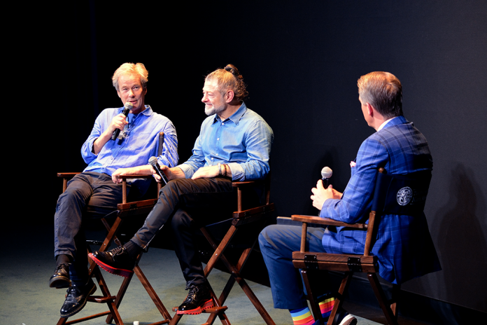 Andy Serkis (C) speaks about his new film, Animal Farm, with business partner Jonathan Cavendish (L) during a fireside chat with Scott Jennings (R). (Judith Y. Kim/Washington Examiner)
