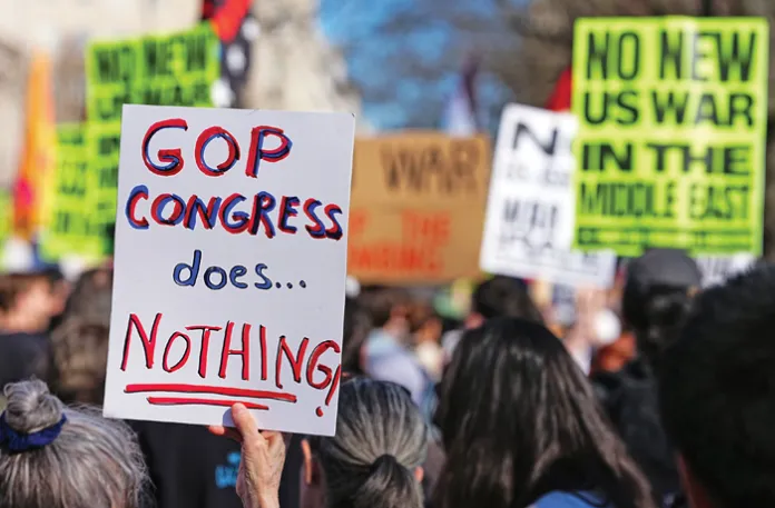 A protest in front of the White House during attacks on Iran, Feb. 28, 2026. (Aaron Schwartz/Bloomberg/Getty)