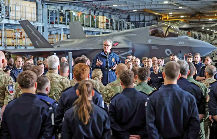 British Prime Minister Keir Starmer speaks in Plymouth, England, in front 
of one of the Royal Air Force’s 119 planes, April 24, 2025. ( Richard Pohle / AP)
