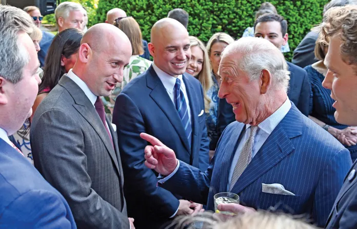 King Charles III speaks with White House Deputy Chief of Staff for Policy Stephen Miller at a garden party at the British Embassy in Washington, D.C., April 27, 2026. (Roberto Schmidt / Getty Images)