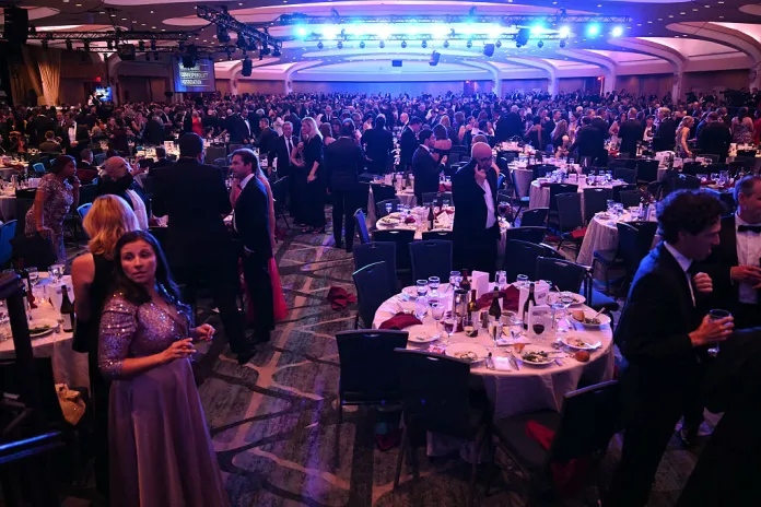 Attendees are seen inside the ballroom after shots were reportedly fired during the White House Correspondents' dinner at the Washington Hilton in Washington, DC, on April 25, 2026. Shots were allegedly fired as US President Donald Trump attended a press dinner in Washington on Saturday night, witnesses and AFP reporters said as loud bangs were heard at the hotel venue. (Photo by Mandel NGAN / AFP via Getty Images)