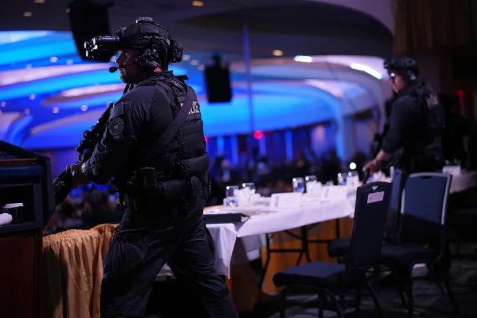 Agents stand guard after an incident at the annual White House Correspondents' Association dinner.