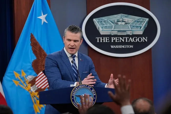 Defense Secretary Pete Hegseth speaks to members of the media during a press briefing at the Pentagon in Washington, Wednesday, April 8, 2026.