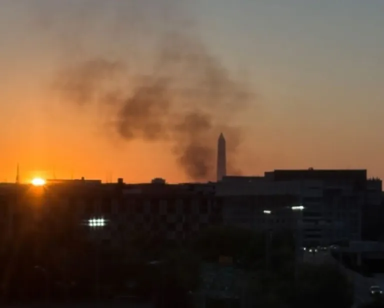 Smoke rises over Washington, D.C., after a bus caught fire.