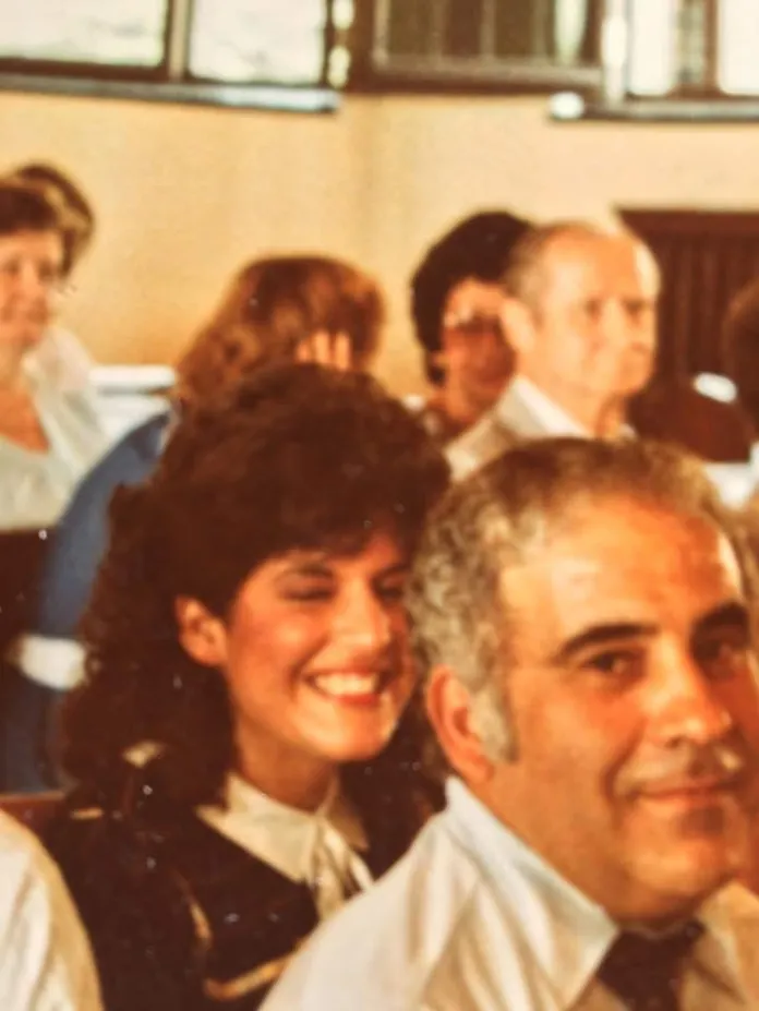 Salena Zito attending mass with her father, Ron Zito, in the foreground, at Nativity of Our Lord Catholic Church