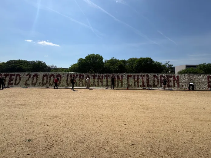 Teddy bear installation with message “PUTIN ABDUCTED 20,000 UKRAINIAN CHILDREN. BRING KIDS BACK.” (Photo by Emily Robertson/Washington Examiner)