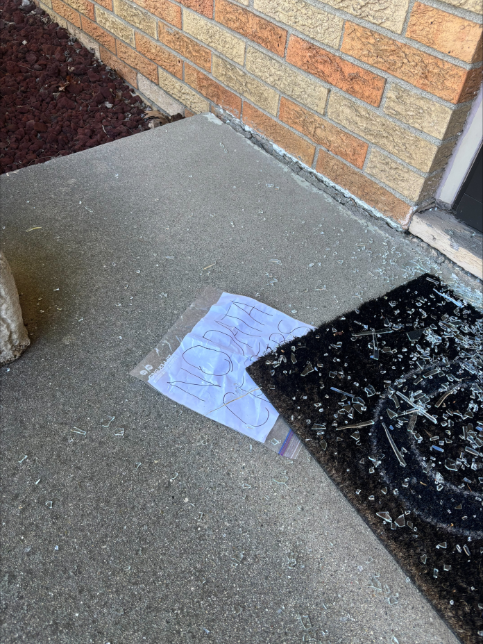 Note reading "No Data Centers" found under Indianapolis City-County Councilor Ron Gibson's door mat.