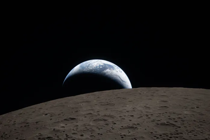 Earth sets behind the Moon during a lunar flyby.
