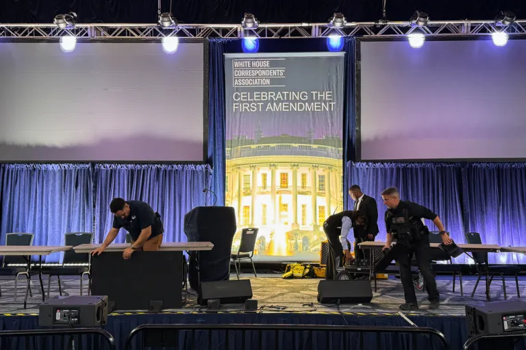 Staff clean up after a shooting incident at the White House Correspondents' Association dinner.