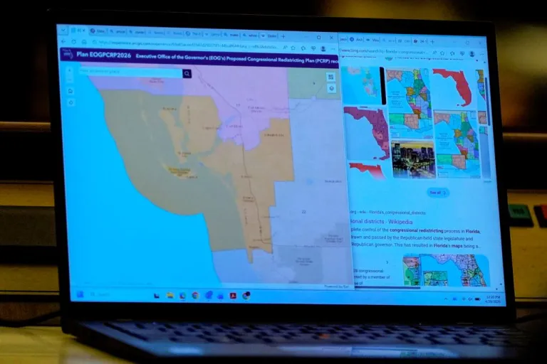 A state senator's laptop displays a proposed Congressional Redistricting Plan, Florida's newly drawn map amid a redistricting debate.