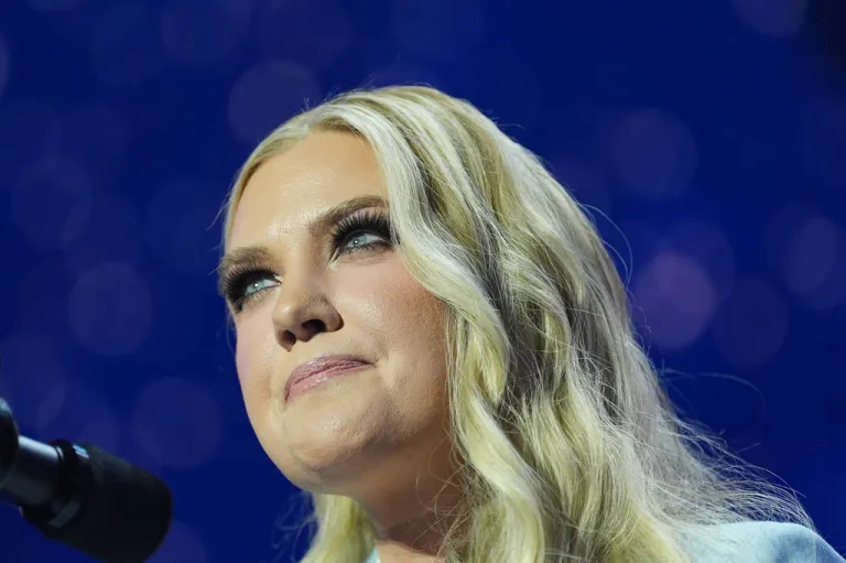 Erika Kirk speaks before President Donald Trump at a Turning Point USA event.