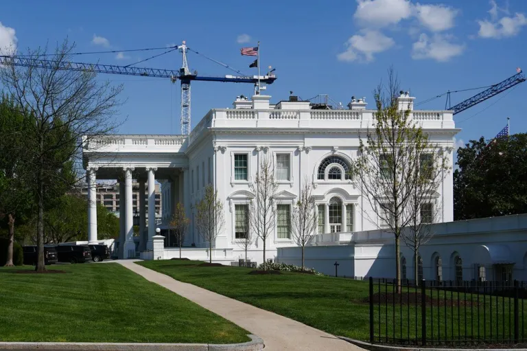 Cranes being used to construct the new White House ballroom are seen around the White House, Saturday, April 4, 2026, in Washington.