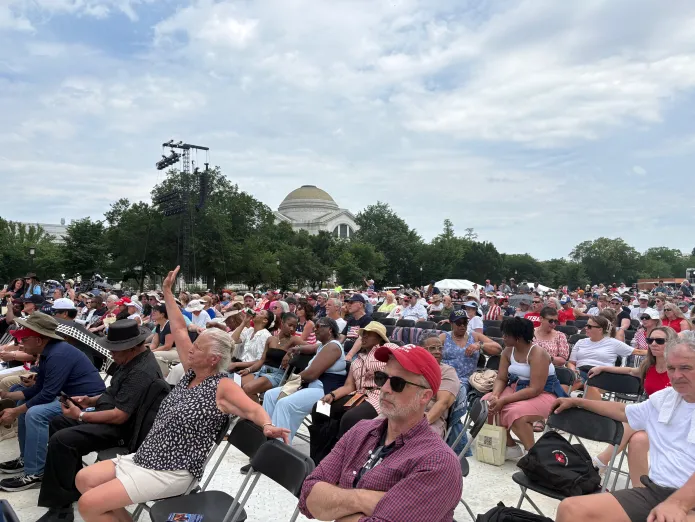 Americans worshipping and listening at Rededicate 250 on the National Mall.