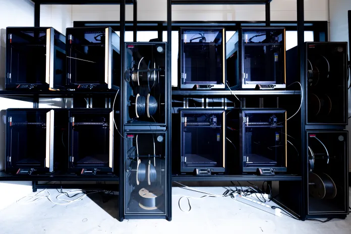 A stack of 3-D printers