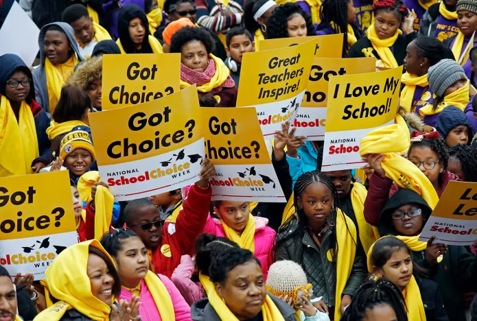 Several hundred students, parents, teachers and elected officials, participate in a school choice rally, part of the National School Choice Week, on the steps of the Capitol in Jackson, Miss., Tuesday, Jan. 22, 2019. The attendees came from throughout the state and gathered to raise public awareness for the different K-12 education options available. (AP Photo/Rogelio V. Solis)