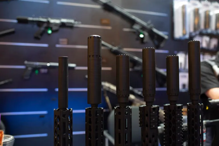 This photo taken Tuesday, Jan. 21 2020, shows firearms and suppressors on display at SHOT Show.