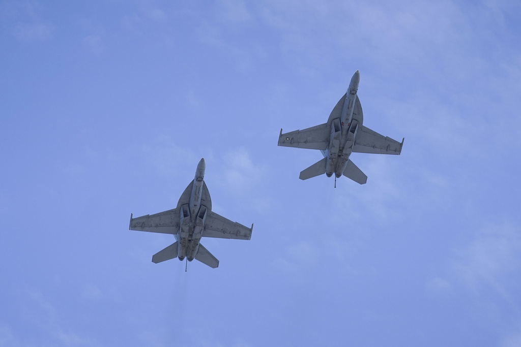 All four pilots safe after ejecting from two F-18s that collided at air show