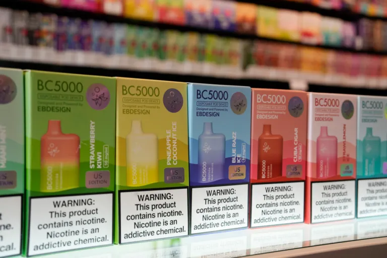 Varieties of disposable flavored electronic cigarette devices manufactured by EB Design, formerly known as Elf Bar, are displayed at a store in Pinecrest, Fla., Monday, June 26, 2023. On Thursday, Dec. 14, 2023, U.S. officials announced they have recently seized more than 1.4 million illegal e-cigarettes from the Chinese manufacturer behind Elf Bar, a line of fruity disposable vapes that has become the top brand among underage American teens. (AP Photo/Rebecca Blackwell, File)