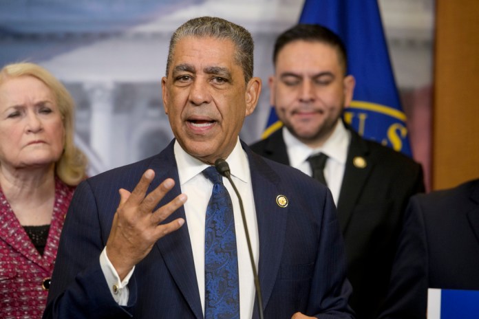 Congressional Hispanic Caucus Chair Rep. Adriano Espaillat, D-N.Y., speaks as Rep. Sylvia Garcia, D-Texas, left, and Rep. Gabe Vazquez, D-Calif., right, listen during a press conference by the Congressional Hispanic Caucus, on immigration and border priorities, on Capitol Hill, Thursday, Feb. 6, 2025, in Washington. (AP Photo/Rod Lamkey, Jr.)