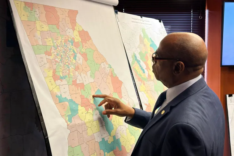 Georgia state Rep. Mack Jackson (D) looks at a map of proposed state House districts.