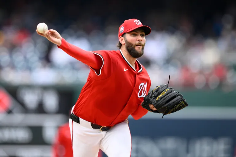 Washington Nationals starting pitcher Trevor Williams (32) in action during a baseball game against the Texas Rangers, Sunday, June 8, 2025, in Washington.