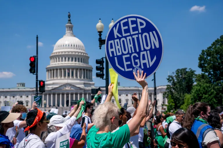 FILE - Abortion-rights activists demonstrate against the Supreme Court decision to overturn Roe v. Wade that established a constitutional right to abortion, on Capitol Hill in Washington, June 30, 2022. (AP Photo/J. Scott Applewhite, File)
