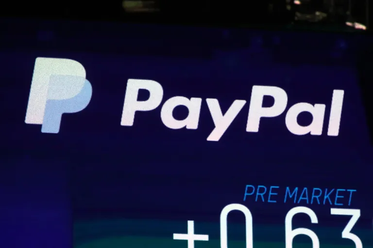 The PayPal logo appears on a screen at the Nasdaq MarketSite, on Oct. 3, 2018.