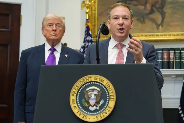 President Donald Trump listens as Environmental Protection Agency director Lee Zeldin speaks.